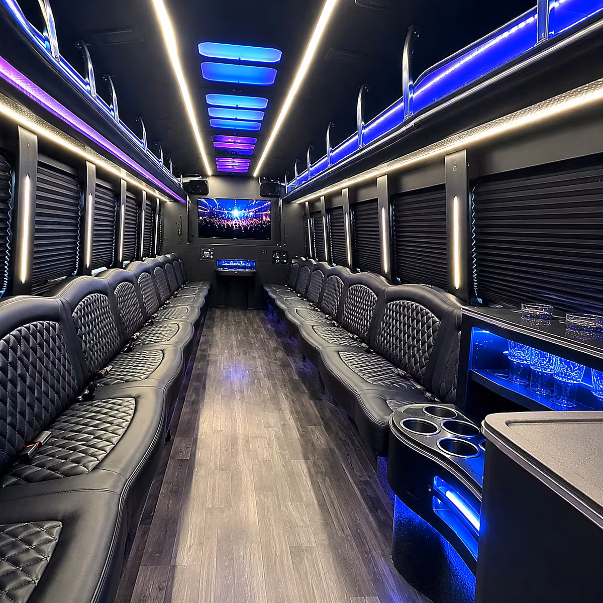 Friends laughing during a party bus celebration in Gresham