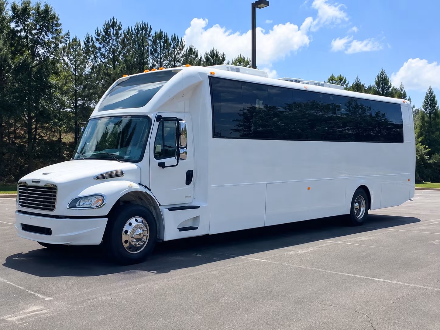 Wedding guests seated inside a party bus serving Gresham